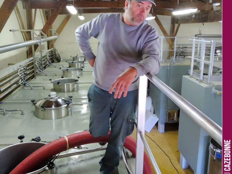 David in action, filling a vat.